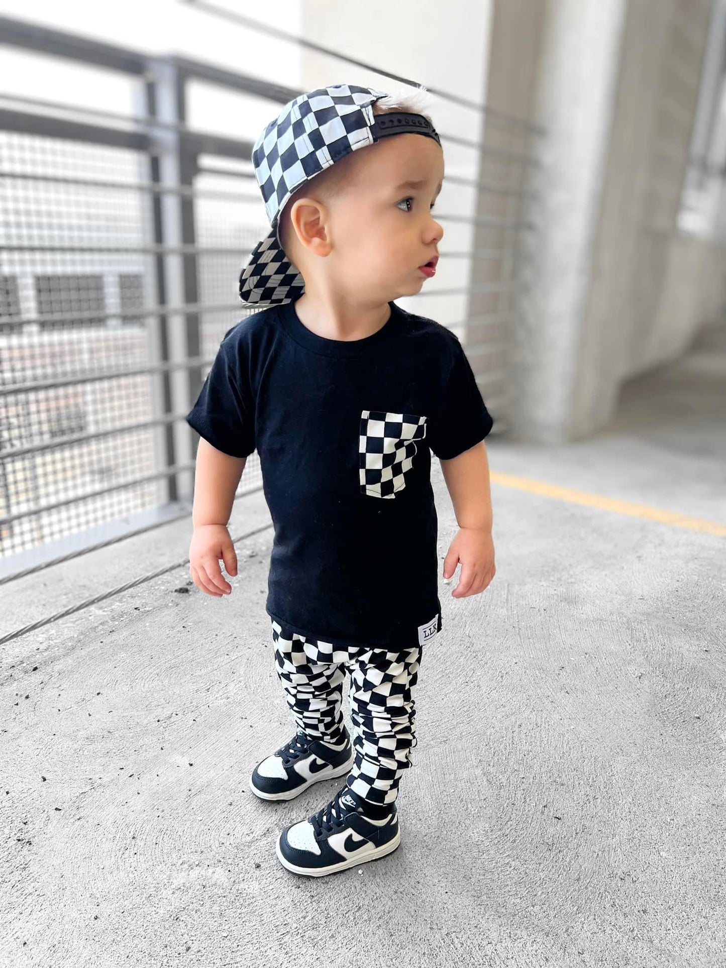 Raw edge check pocket tee